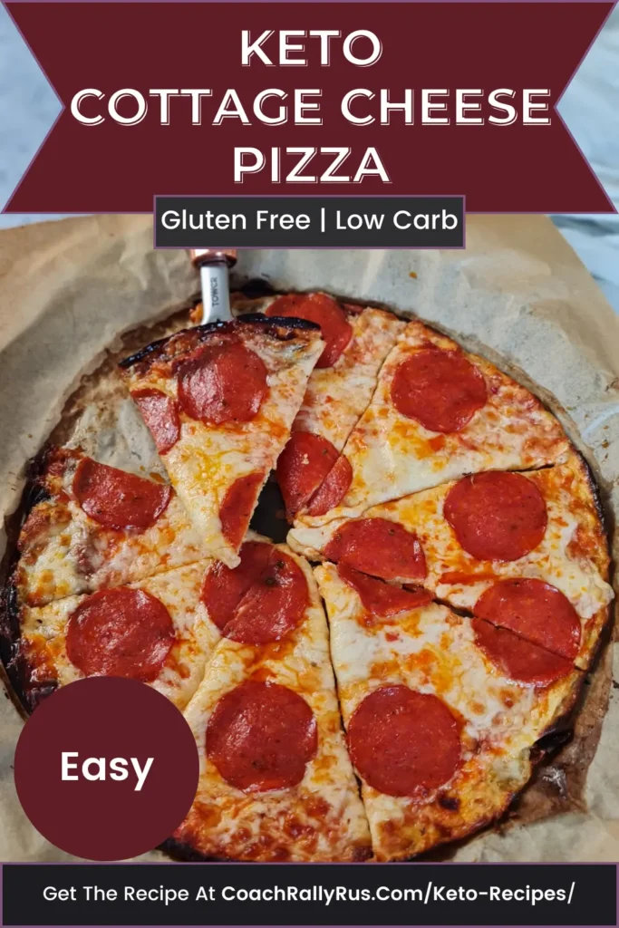 A keto-friendly cottage cheese pizza topped with pepperoni slices on parchment paper. Text overlay reads ‘Keto Cottage Cheese Pizza,’ ‘Gluten Free,’ ‘Low Carb,’ and ‘Easy.’ A call to action at the bottom says ‘Get The Recipe At CoachRallyRus.Com/Keto-Recipes.