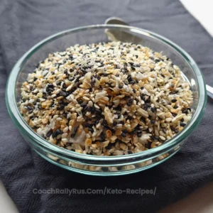 A close-up view of Everything Bagel Seasoning in a glass bowl.