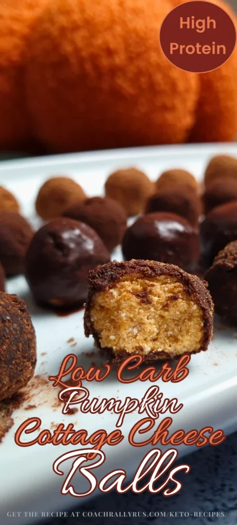 A vertical image showcasing a plate of Keto Cottage Cheese Pumpkin Balls, some coated in chocolate and others plain, with a vibrant orange pumpkin in the background.