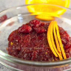 Spiced Keto Cranberry-Orange Relish with orange zest garnish, sugar-free and perfect for keto-friendly holiday meals.