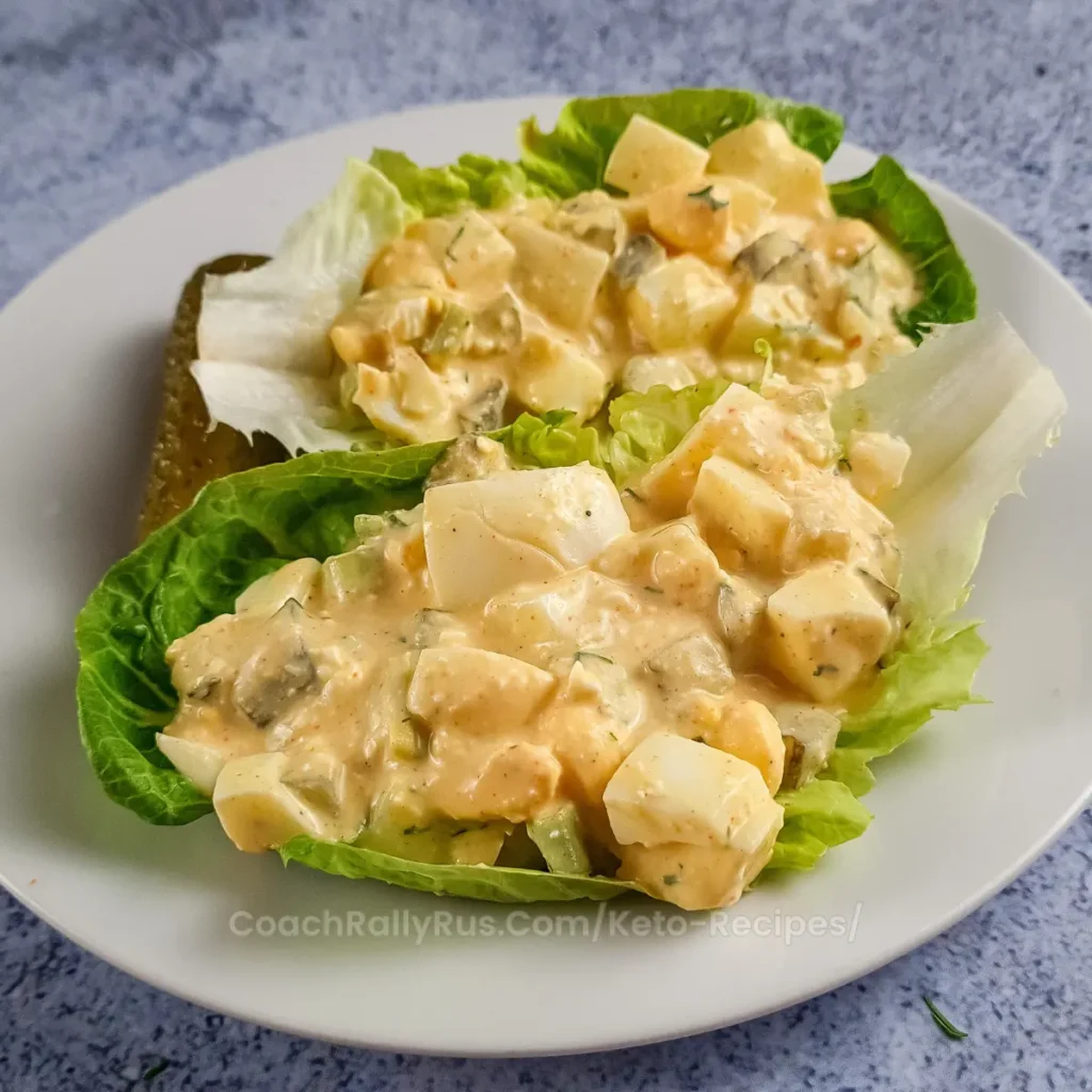 Keto cottage cheese dill pickle egg salad served in fresh lettuce cups for a low-carb and gluten-free option.