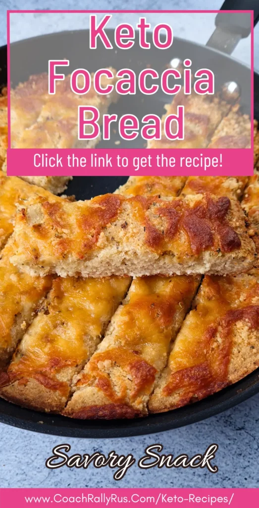 Golden-brown keto focaccia bread made with cottage cheese, sliced and ready to serve in a skillet.