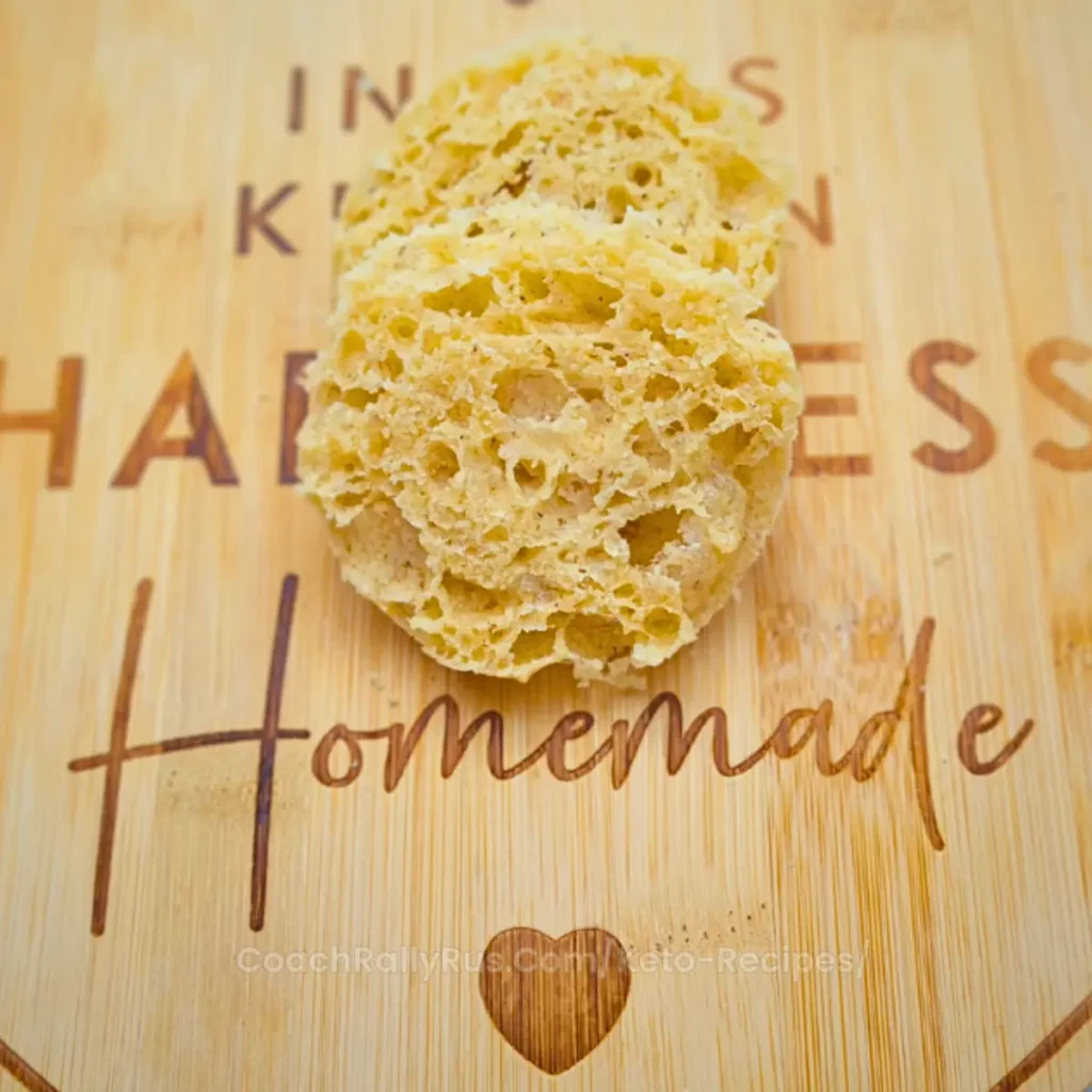 Keto mug bread slices on a wooden board with “Homemade” text.