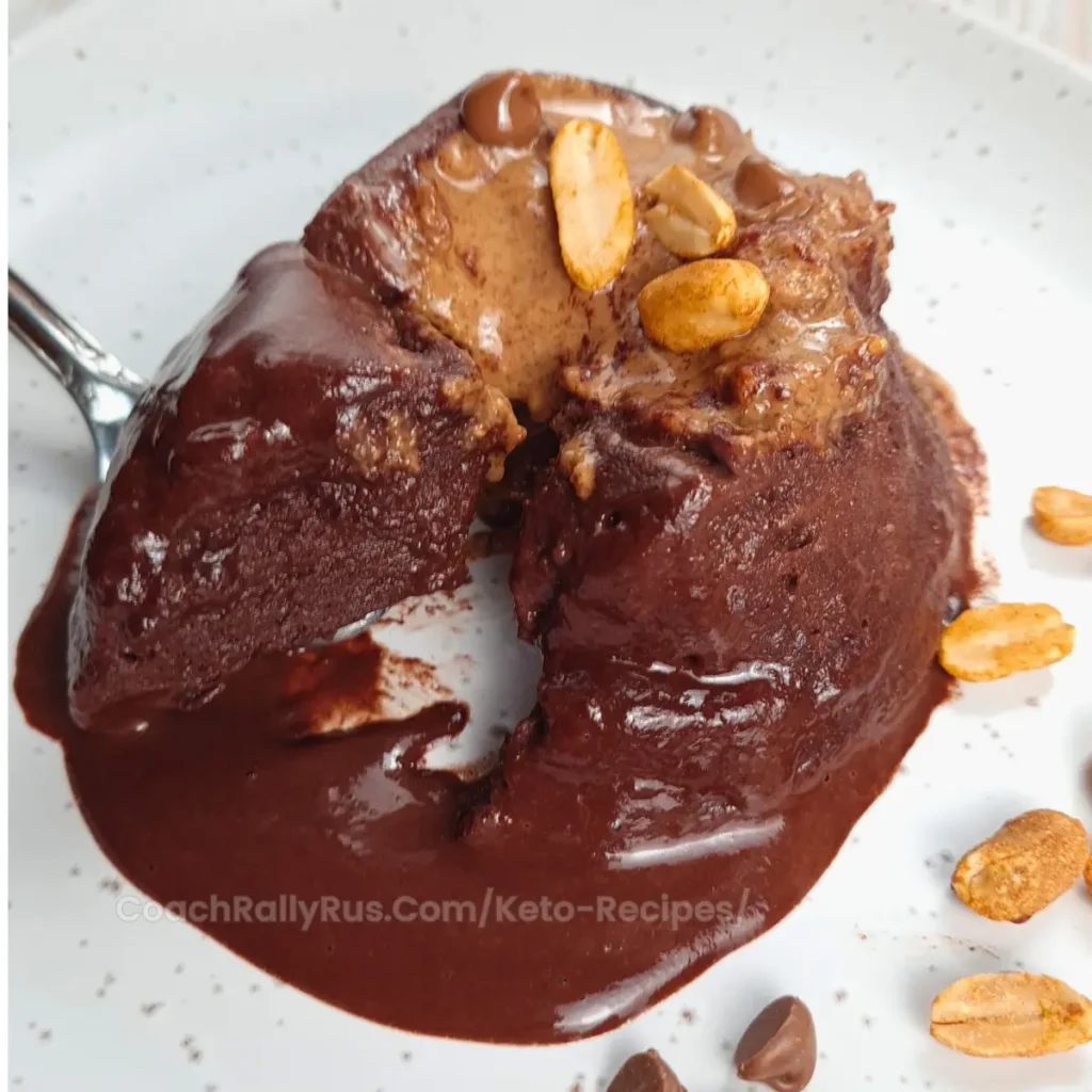 High-protein keto chocolate peanut butter mug cake cut open.