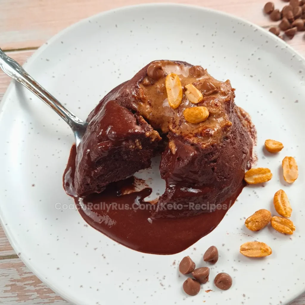 Keto chocolate mug cake with peanut butter and chocolate chips.