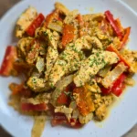 Keto chicken gyro casserole with melted cheese and Greek seasoning.