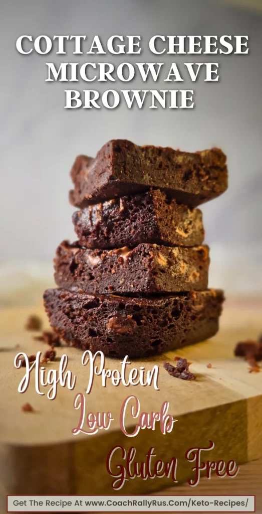 Fudgy keto cottage cheese brownie stacked on a wooden board.