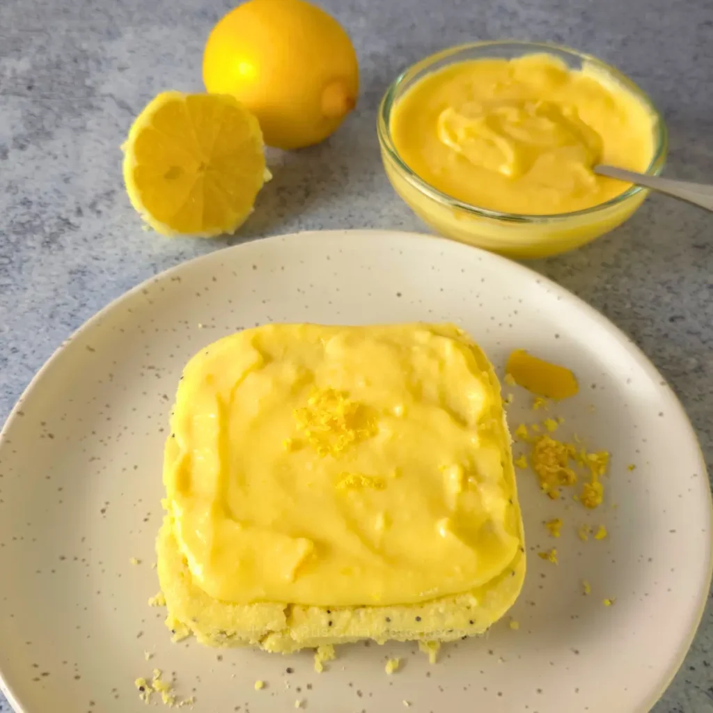Keto lemon cottage cheese bread topped with lemon curd