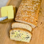 sliced eggless high protein keto bread with melted butter and everything bagel seasoning