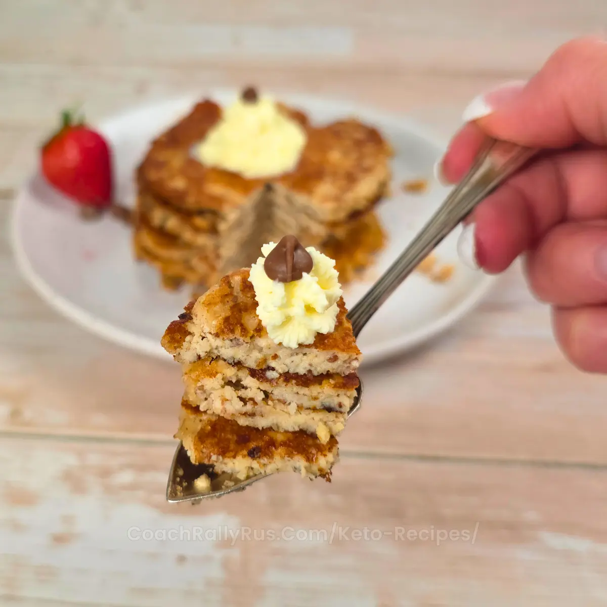 Bite of fluffy keto cottage cheese pancakes on a fork