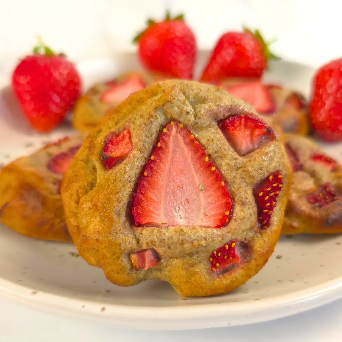 Keto strawberry chia cookies with fresh sliced strawberries on top