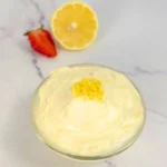 Overhead view of keto lemon cheesecake fluff with lemon zest garnish
