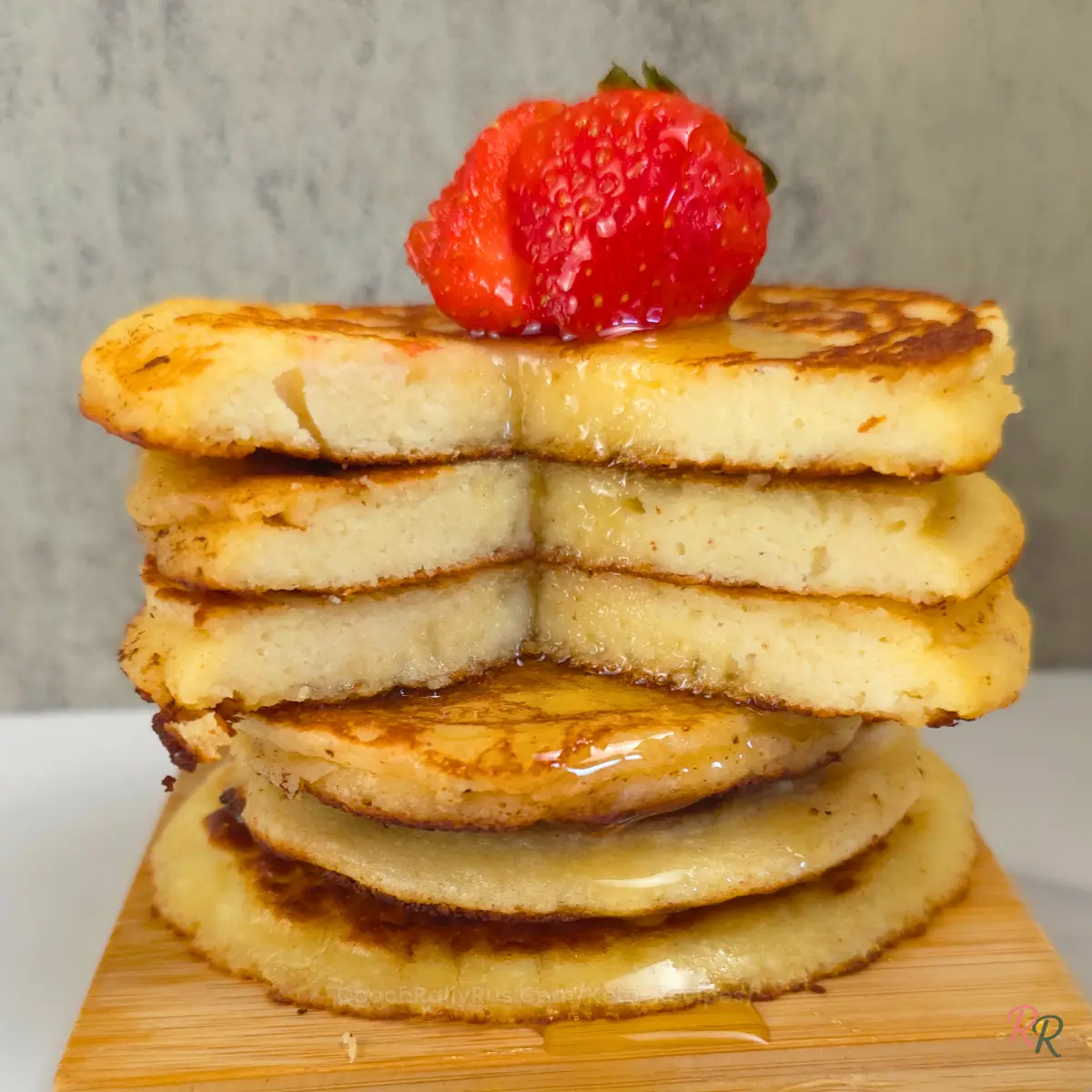 Keto Almond Flour Cottage Cheese Pancakes with Syrup and Strawberry