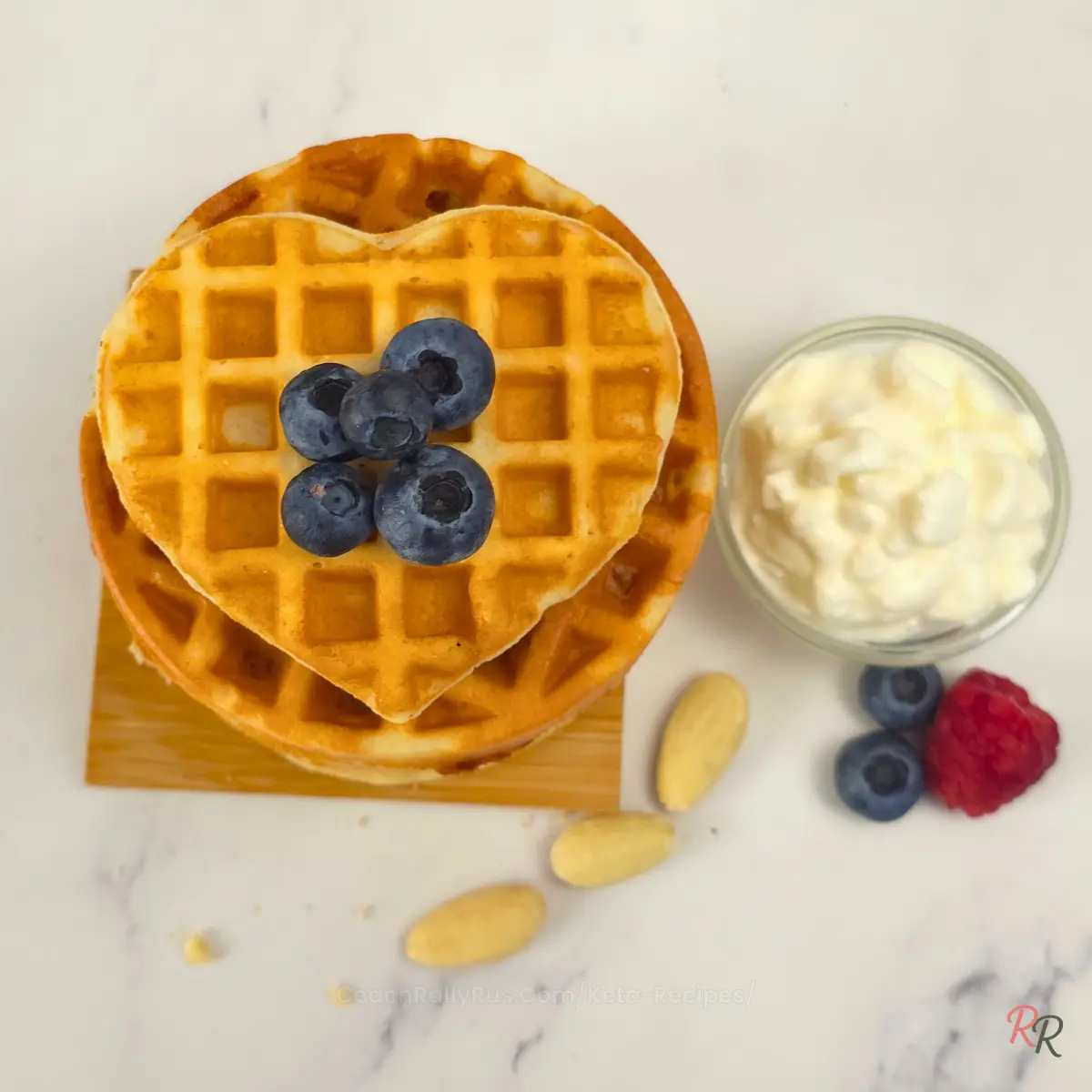 Heart-shaped keto cottage cheese waffle with cottage cheese and berries by Rally Rus