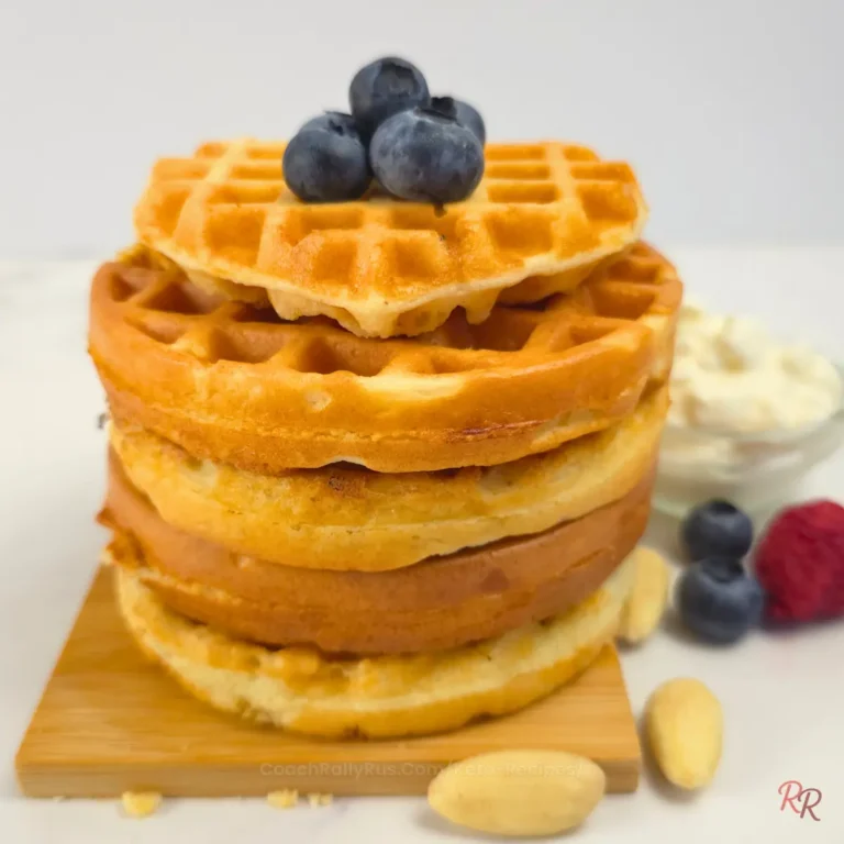 Keto waffles stacked with berries and cottage cheese on the side by Rally Rus