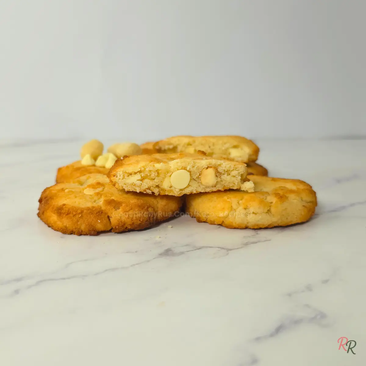 Low Carb Gluten Free White Chocolate Macadamia Cookies Keto white chocolate macadamia cookies with sugar free chocolate chips and buttery macadamias.