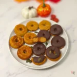 Plate of keto pumpkin donuts with almond flour and cottage cheese, plain and chocolate glazed
