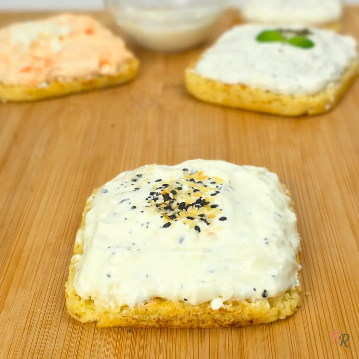 Whipped Cottage Cheese Dip on Toast – Keto Everything Bagel Spread Whipped cottage cheese with everything bagel seasoning spread on a toasted slice of keto mug bread.