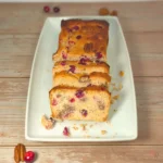 Keto cranberry cottage cheese bread sliced and arranged on a serving plate