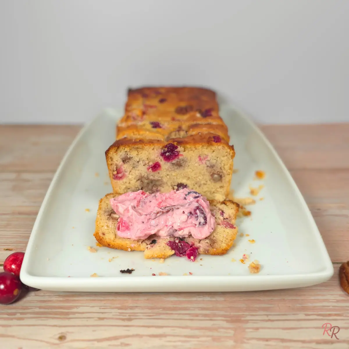 Keto cranberry bread slice served with cranberry cottage cheese salad