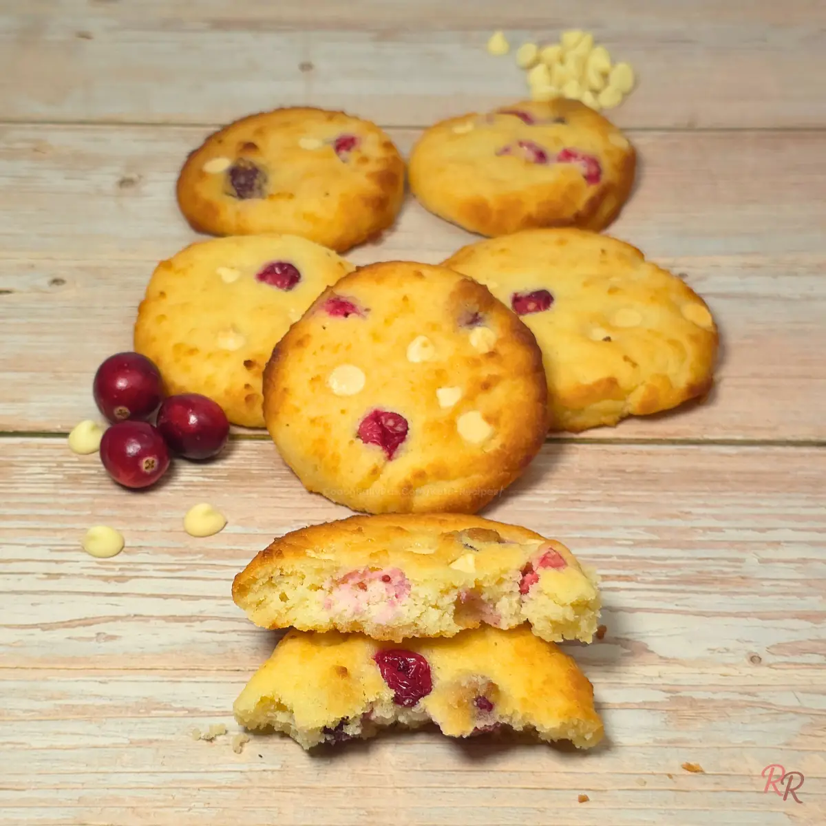 Gluten Free Keto Cranberry White Chocolate Cottage Cheese Cookies Broken keto cranberry white chocolate cottage cheese cookie showing soft interior