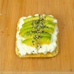 Avocado cottage cheese toast on keto cottage cheese mug bread with everything bagel seasoning