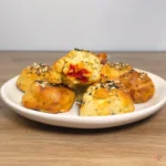 Keto cottage cheese pizza bagel bites with pepperoni and mozzarella center