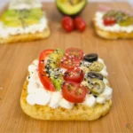 Mediterranean cottage cheese toast on keto cottage cheese mug bread with tomatoes and olives